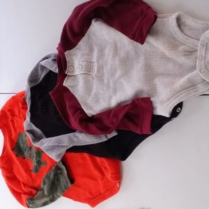 3 onsie long sleeve shirts size 24mths. Hardly worn. Garanimals
